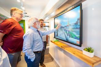 The Mayor and Councilors use the interactive map in the Capstone Discovery Bus